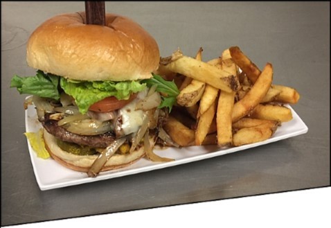 Hand pattied fresh beef blend, topped with smoked pulled pork, mojo sautéed onions, swiss, pickle, tostones (fried green plantain) lettuce and tomato on a brioche roll